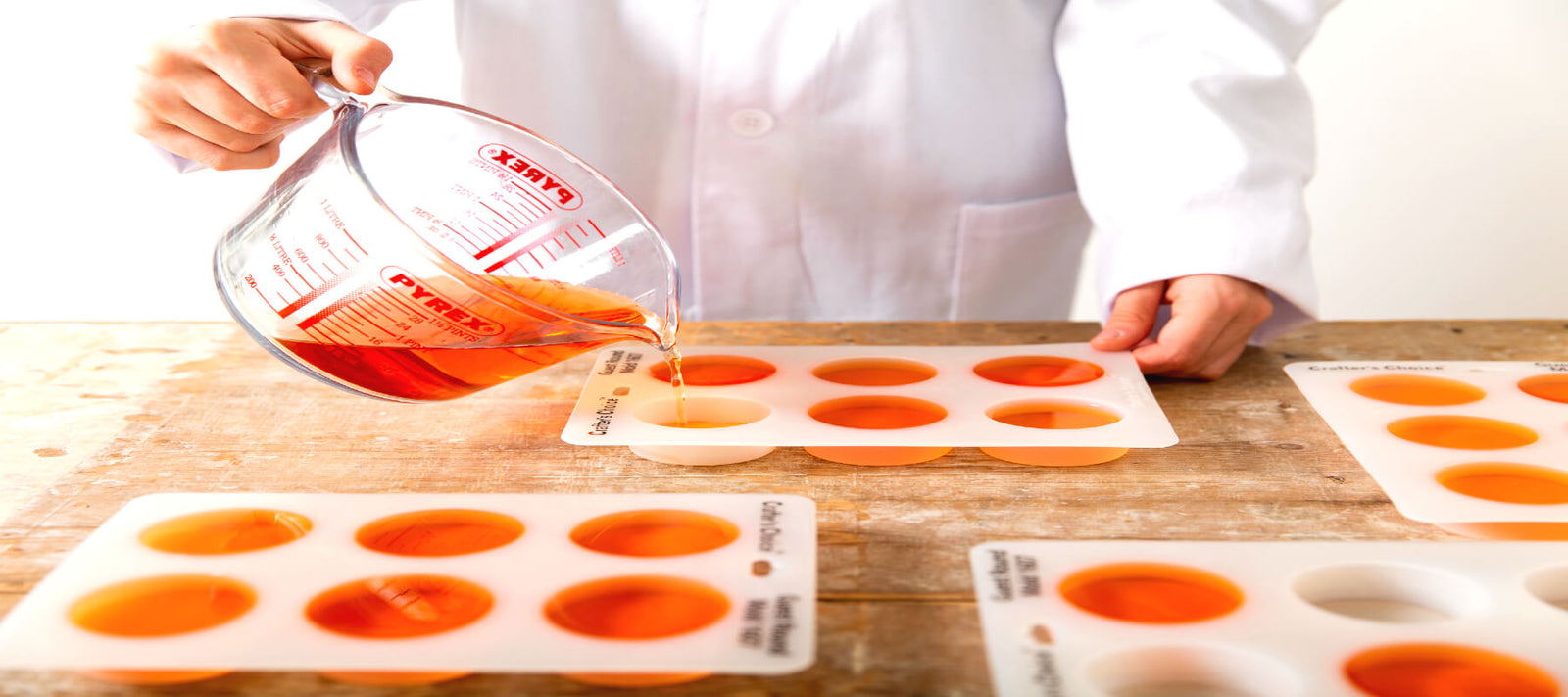 Pouring shampoo into moulds in the production unit